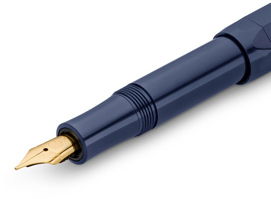 Close-up of the gold-trimmed nib on the Kaweco Classic Sport fountain pen in navy